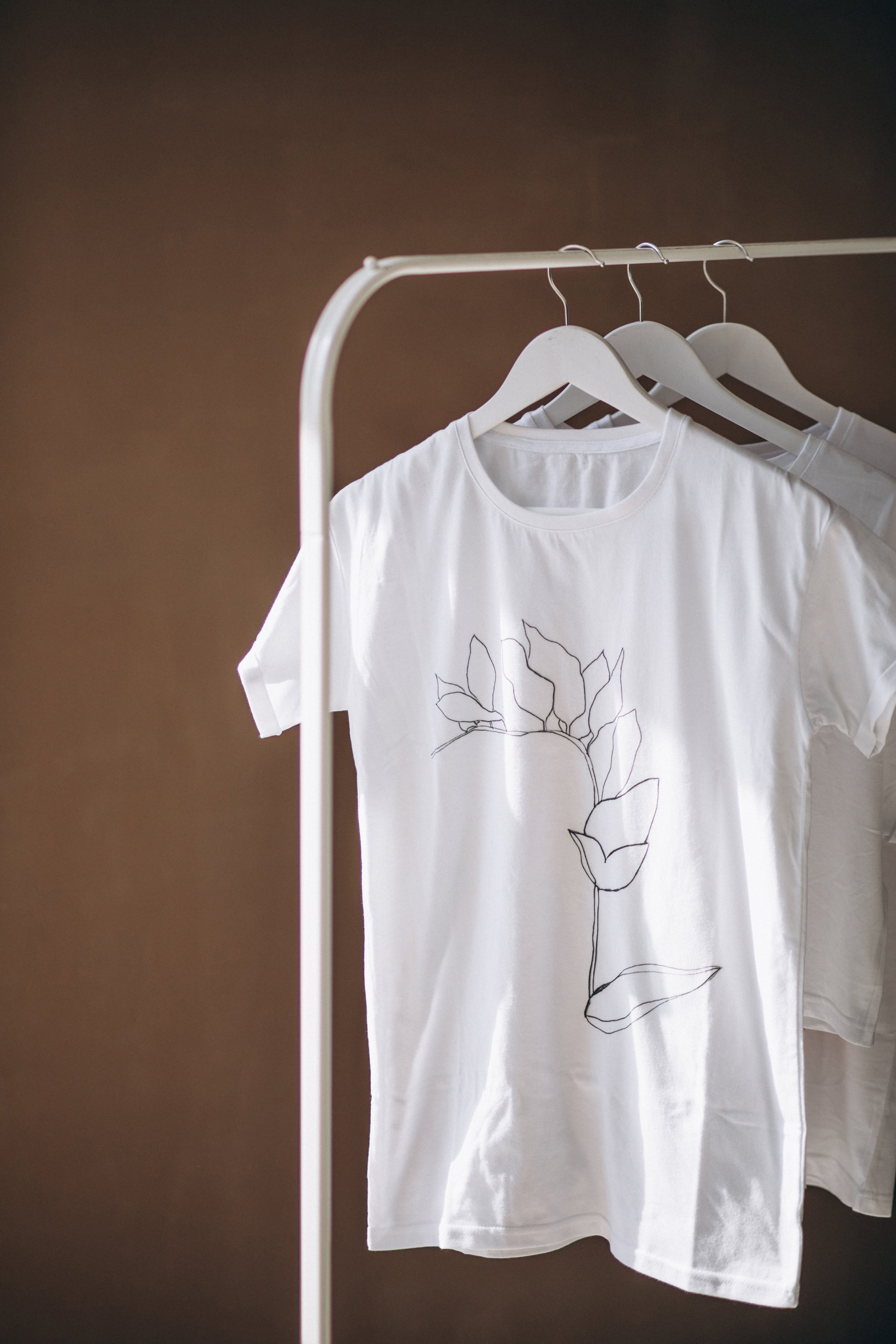 white-shirts-hanging-room